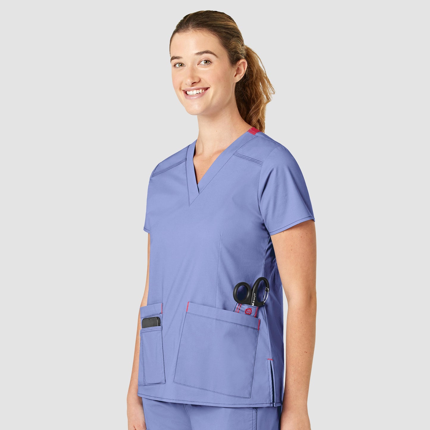 Blusa médica con cuello en V Verity para mujer